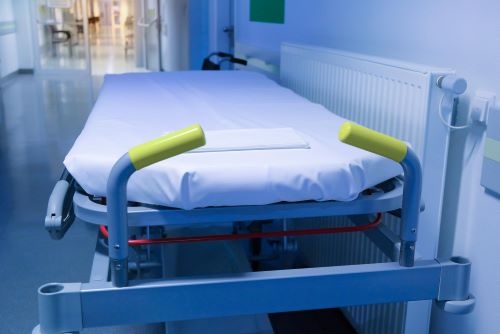 bed-patients-hospital-corridor-close-up_1048944-18620501